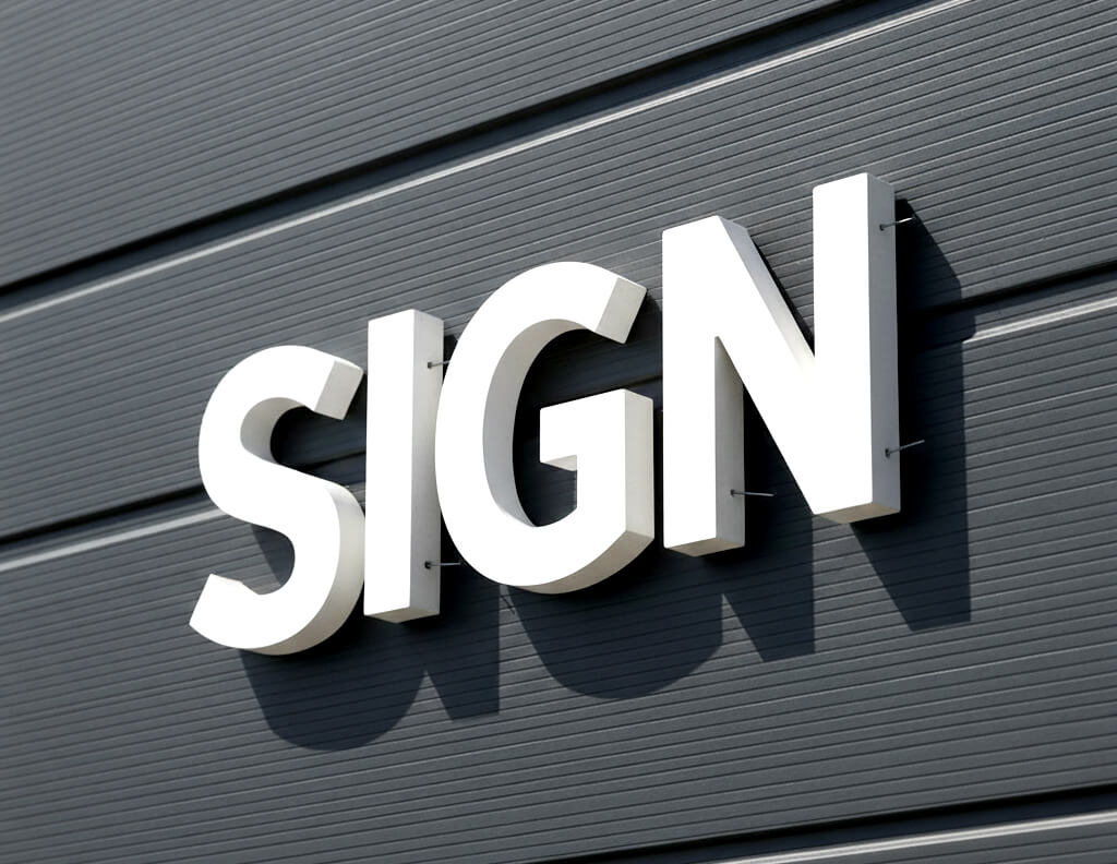 サイディング壁面へカルプ文字を取り付けた画像